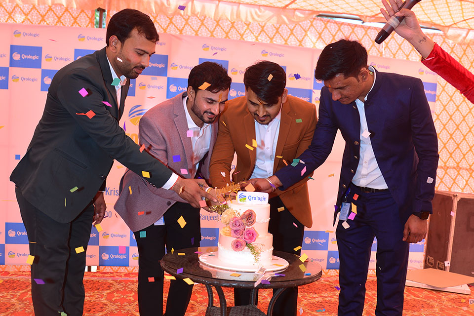 Qrologic Anniversary Cake Cutting